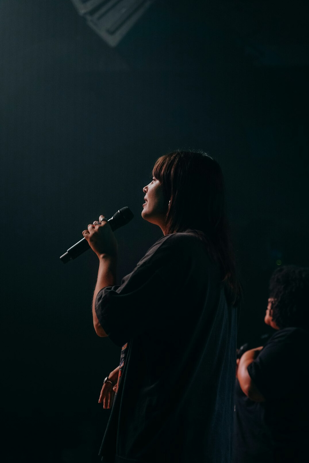 female singer performing on stage