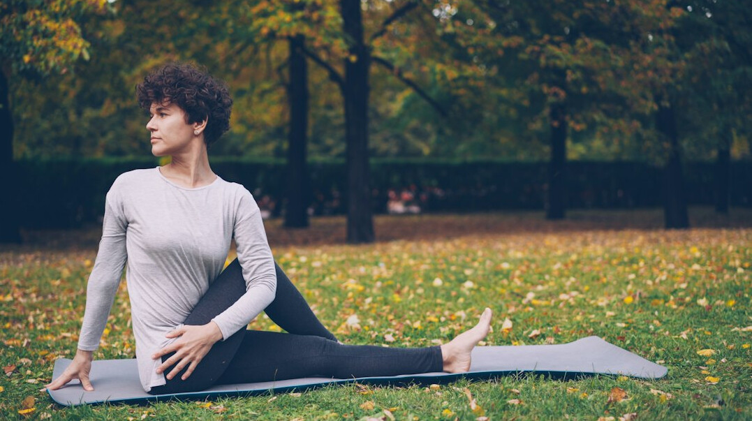 woman doing yoga outdoors