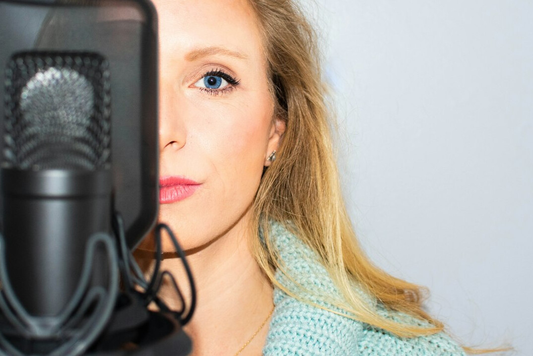 woman recording music in studio